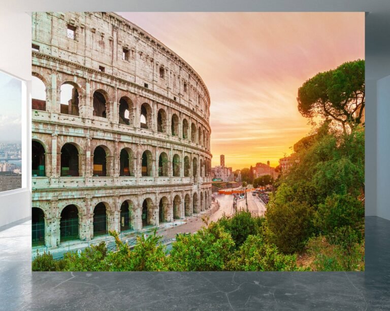 Colosseum illuminated by sunrise amidst greenery on vinyl mural